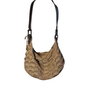 The Sak tan woven shoulder bag purse. crochet. leather handle. zip closure